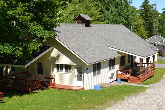 large carriage house with 2 decks