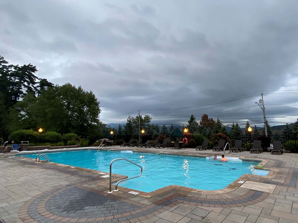 Pool are with stone patio